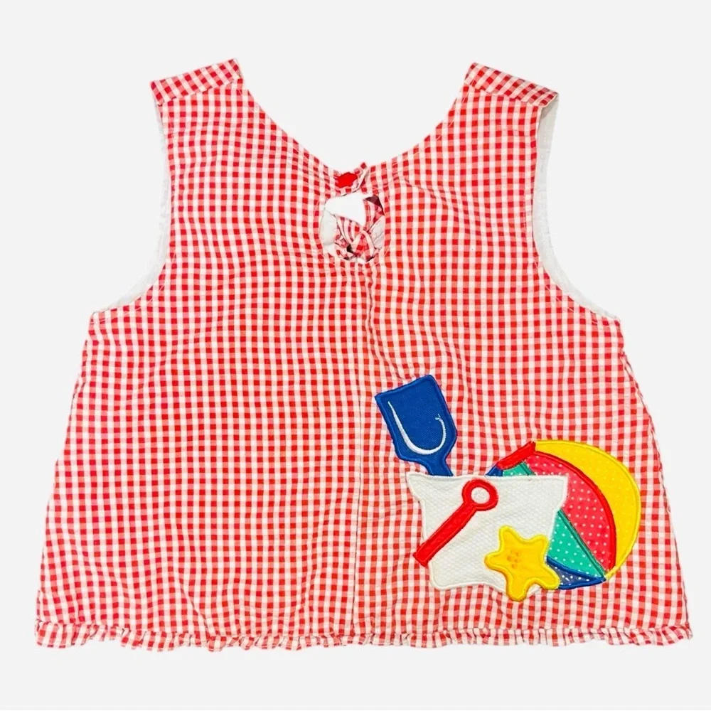 Girls 6 Samara gingham white red apron ruffled hem button detail graphic design